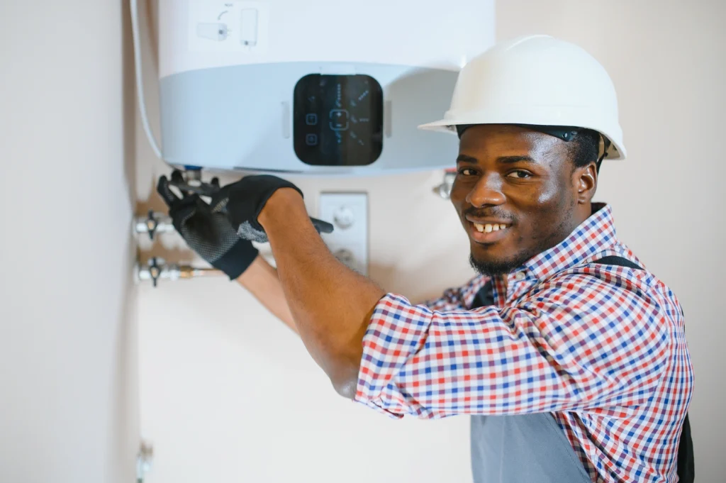 plumber installing water heater